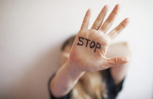 stop written on hand